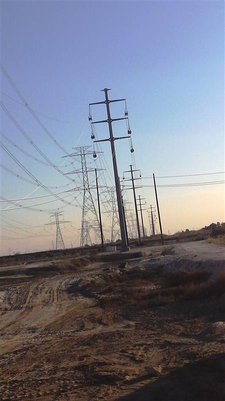 115kV Double Circuit Monopole installation and stringing works Two conductor per phase.